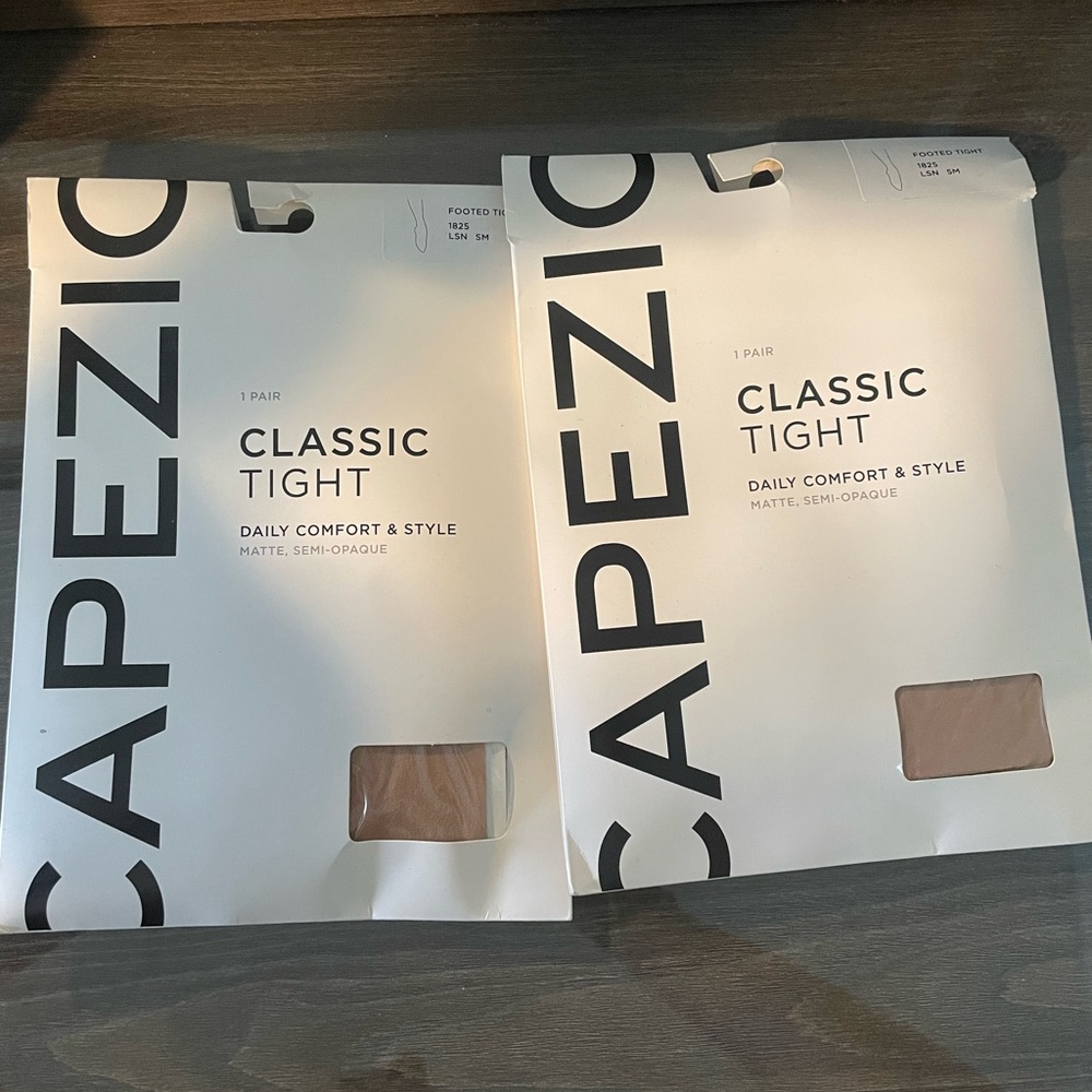 2 Capezio footed tights and 3 hair pieces
